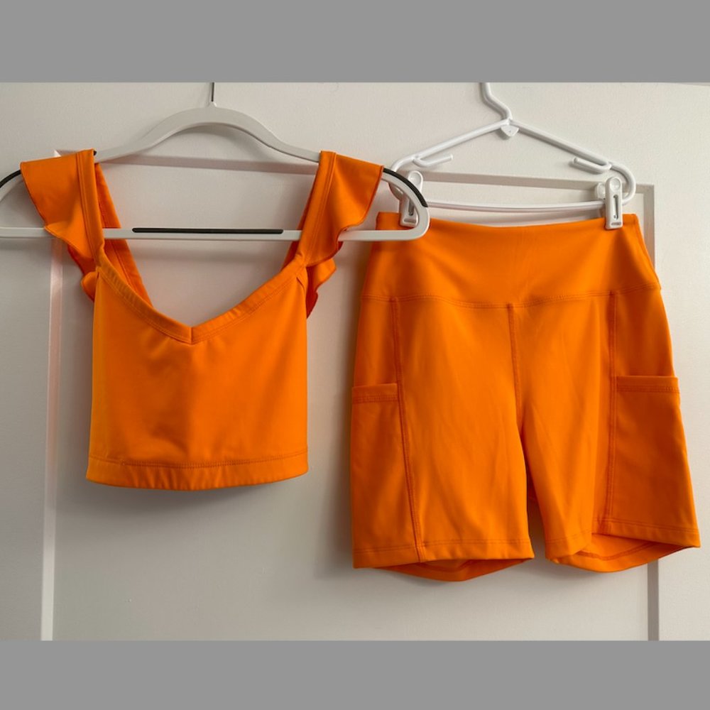 Year of Ours | Ruffle Sports Bra and High Rise Biker Short | Orange | Medium